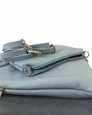 Habiti - Pochette cerchio 100% pelle martellata - CELESTE